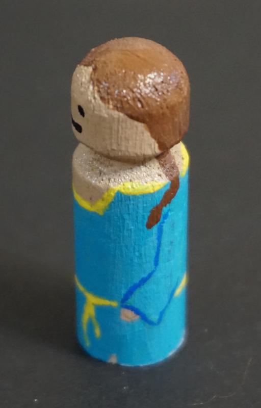 Miniature with arms painted on the sides